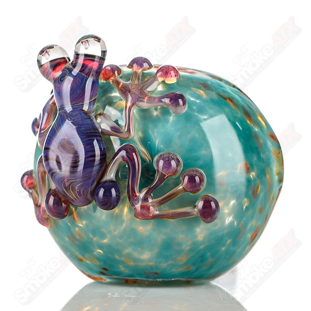 Beezy Glass Frog Spoon Pipe, clear glass with green frog design, smooth bowl and curved mouthpiece for smoking or display.