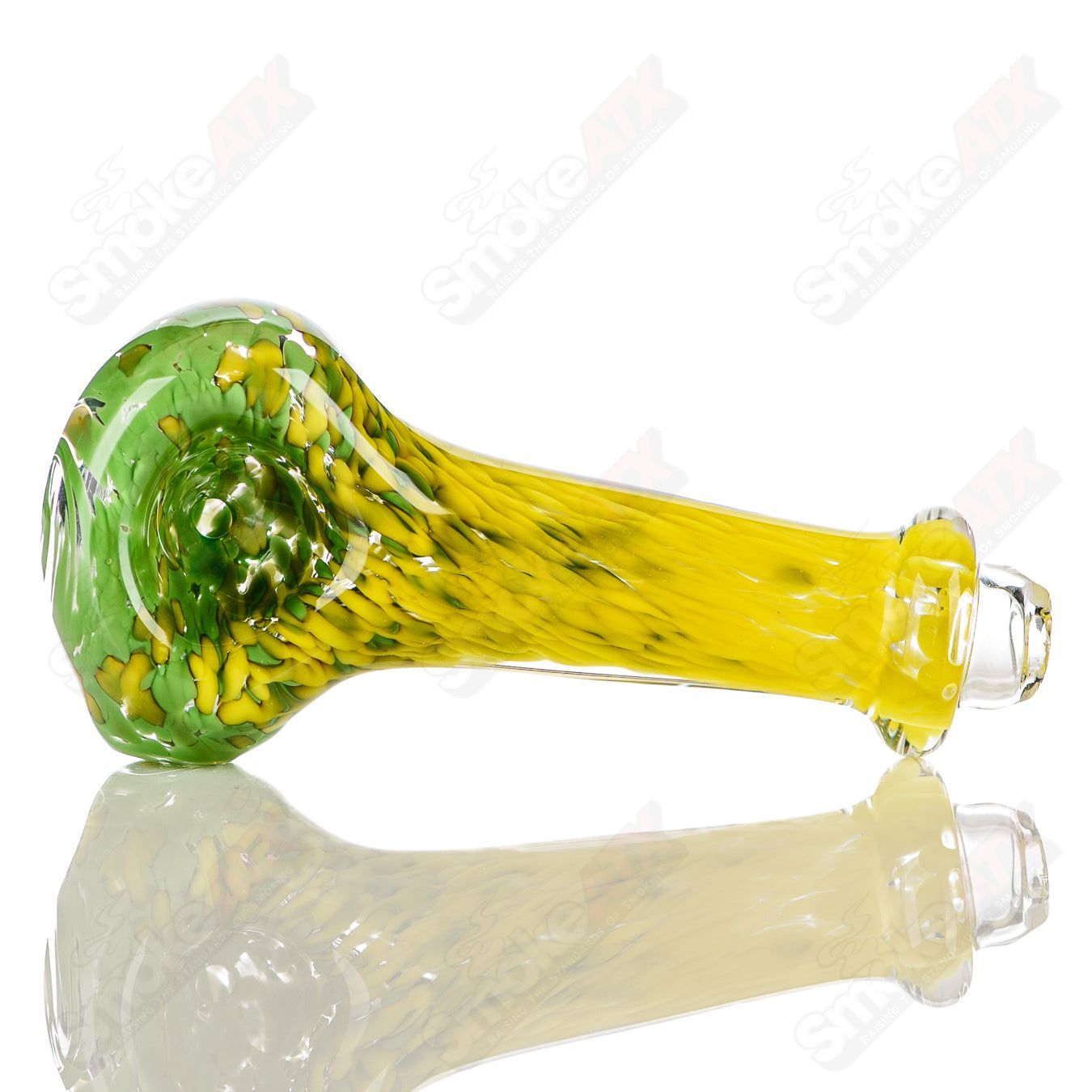 Green and yellow worked frit glass spoon pipe signed by JMK Glass, showcasing vibrant colors and intricate design details.
