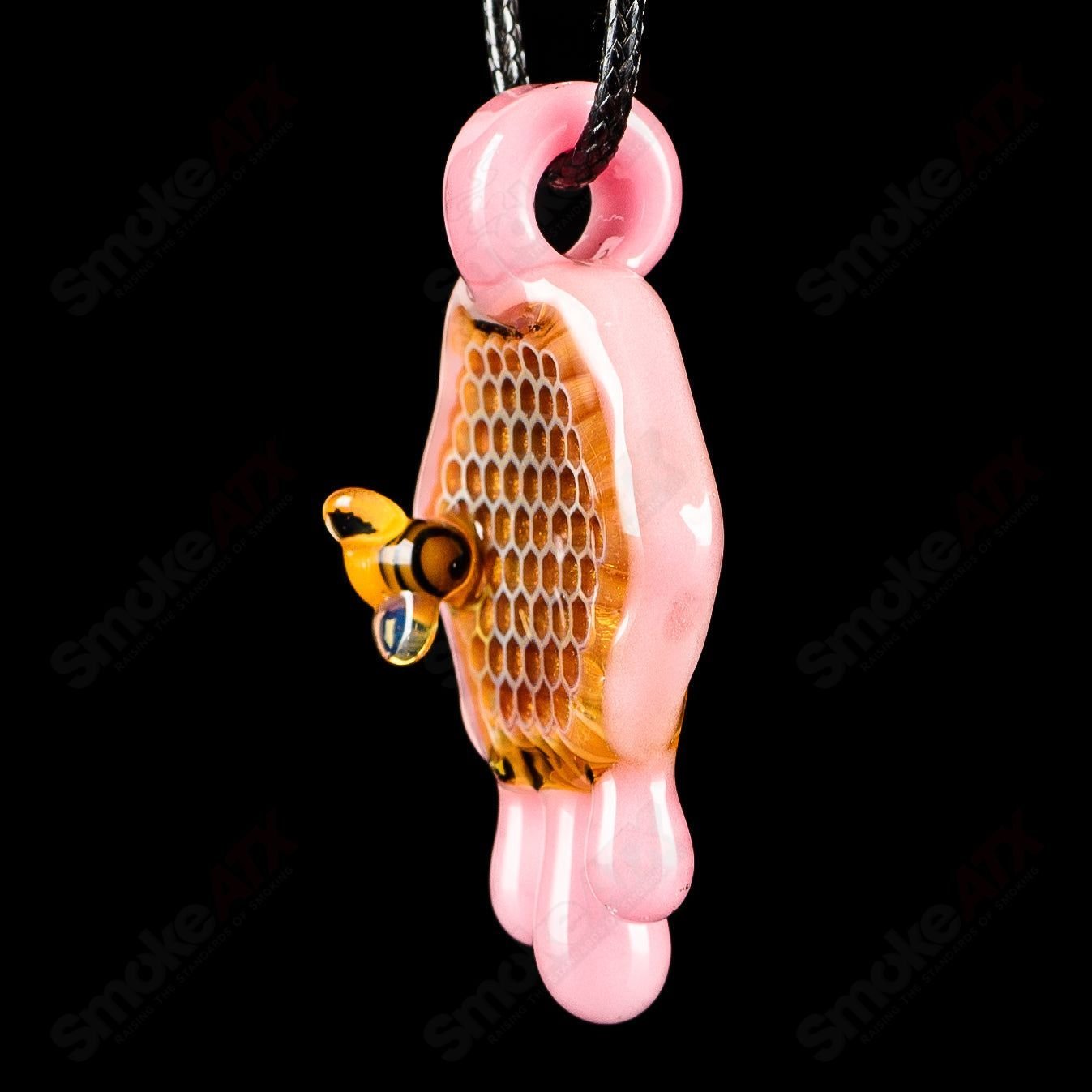 Joe P Glass Cadillac Pink 2-inch honeycomb drip pendant, vibrant heady glass jewelry with intricate design.