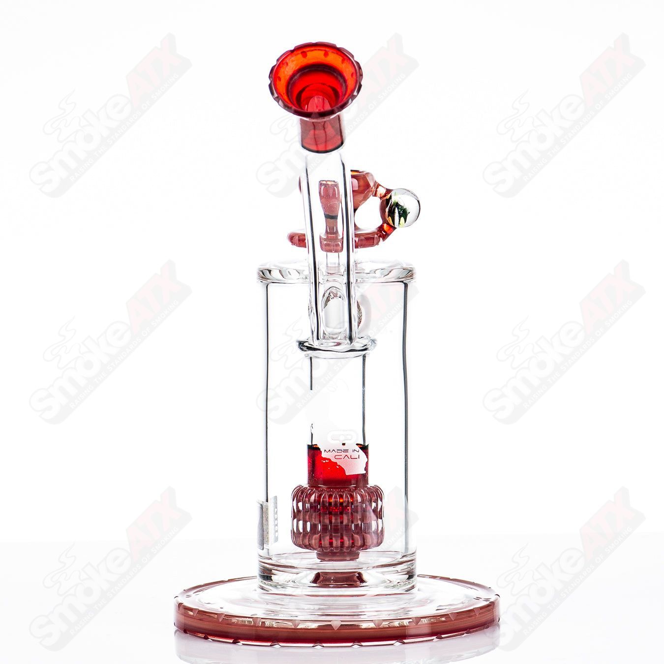 Mobius Ion Matrix V1 Hybrid Series glass waterpipe with intricate design and clear glass body, showcasing its unique shape and craftsmanship.