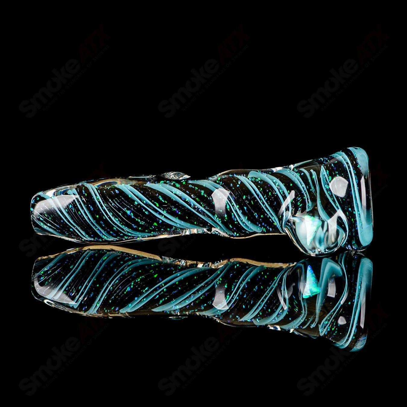 Glass chillum named Opal Hitter by Rotational Science featuring colorful opal accents and a sleek, compact design.