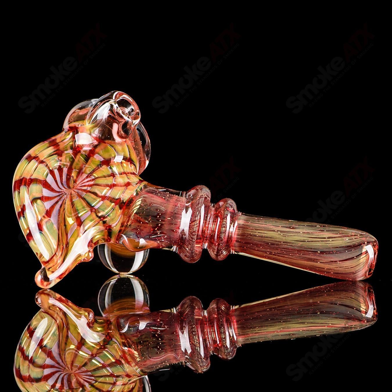 Dosh Glass Phantom Spoon hand pipe in clear glass with a smooth, rounded bowl and sleek design for enjoyable use.
