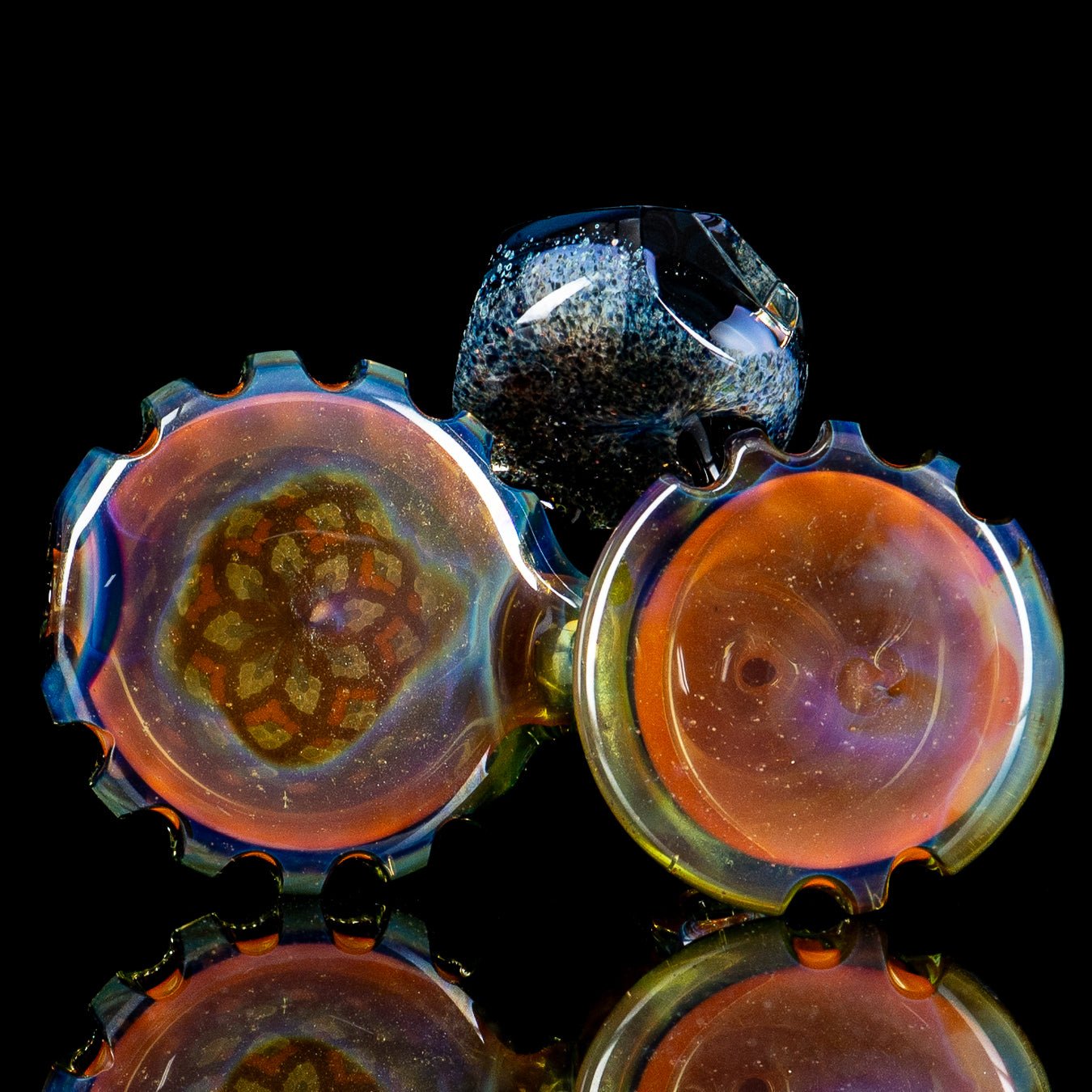 Colorful Heady Glass hand pipe with Dottacello design by Rotational Science, featuring a two-pocket heady glass art piece.
