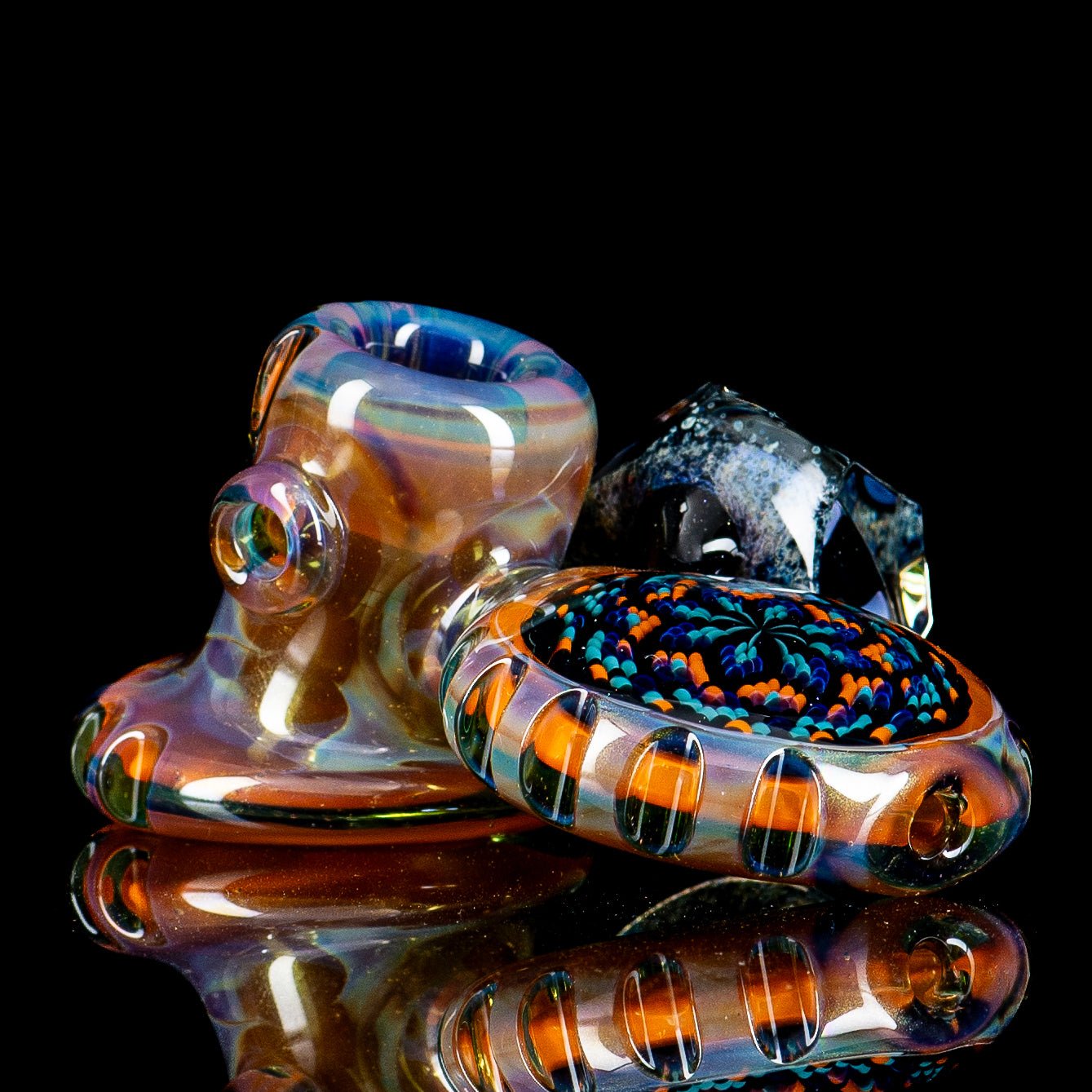 Rotational Science Heady Glass hand pipe with a Dottacello design featuring two pockets and vibrant glass details.
