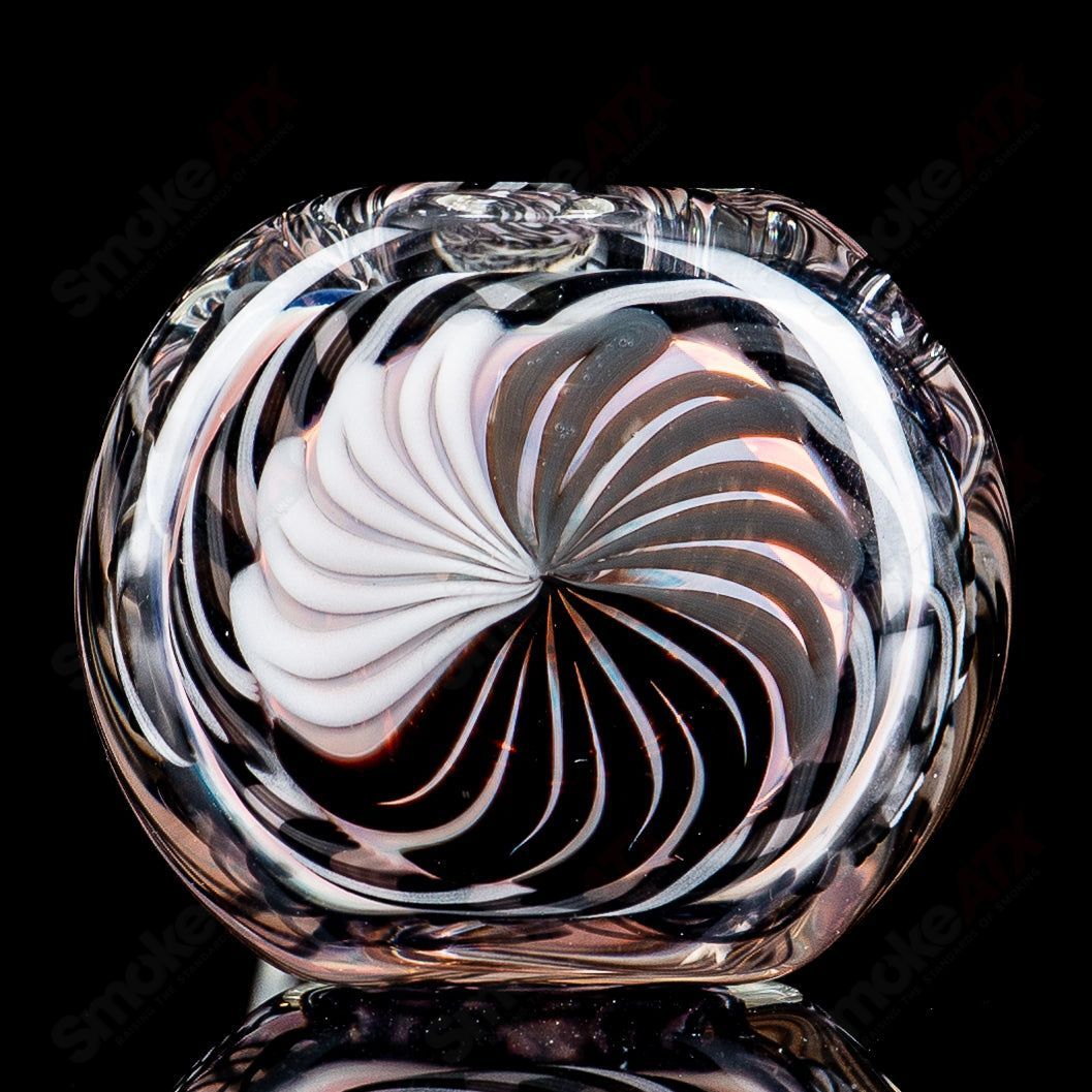 Clear glass pipe with solid cane design and latti spoon handle by Talent Glass Works, showcasing intricate glass craftsmanship.