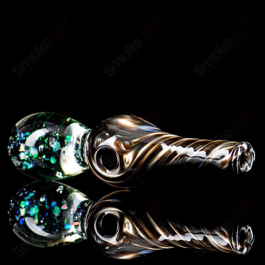Colorful Puffco tops by Geoff Made Glass featuring the UV Puffco Joystick Indo design, crafted from heady glass material.