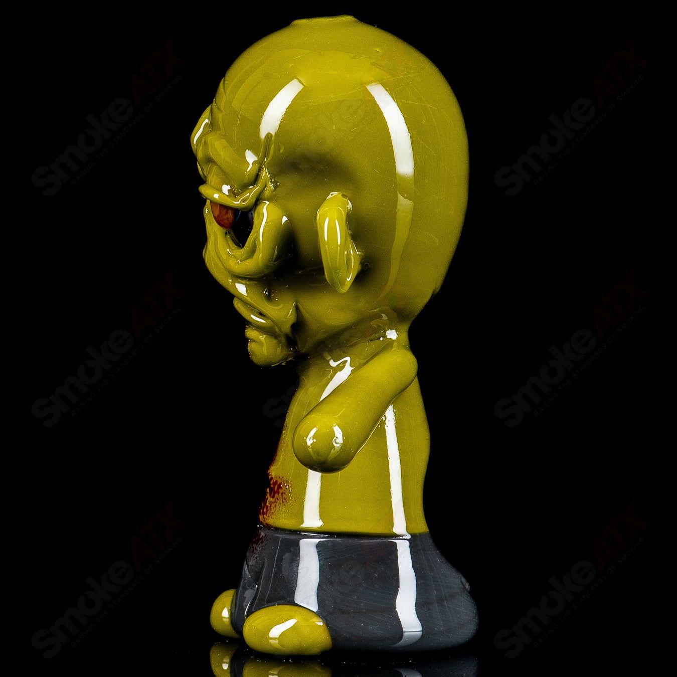 Heady glass zombie hand pipe by Ghost featuring detailed zombie hand design and vibrant colors for smoking enjoyment.