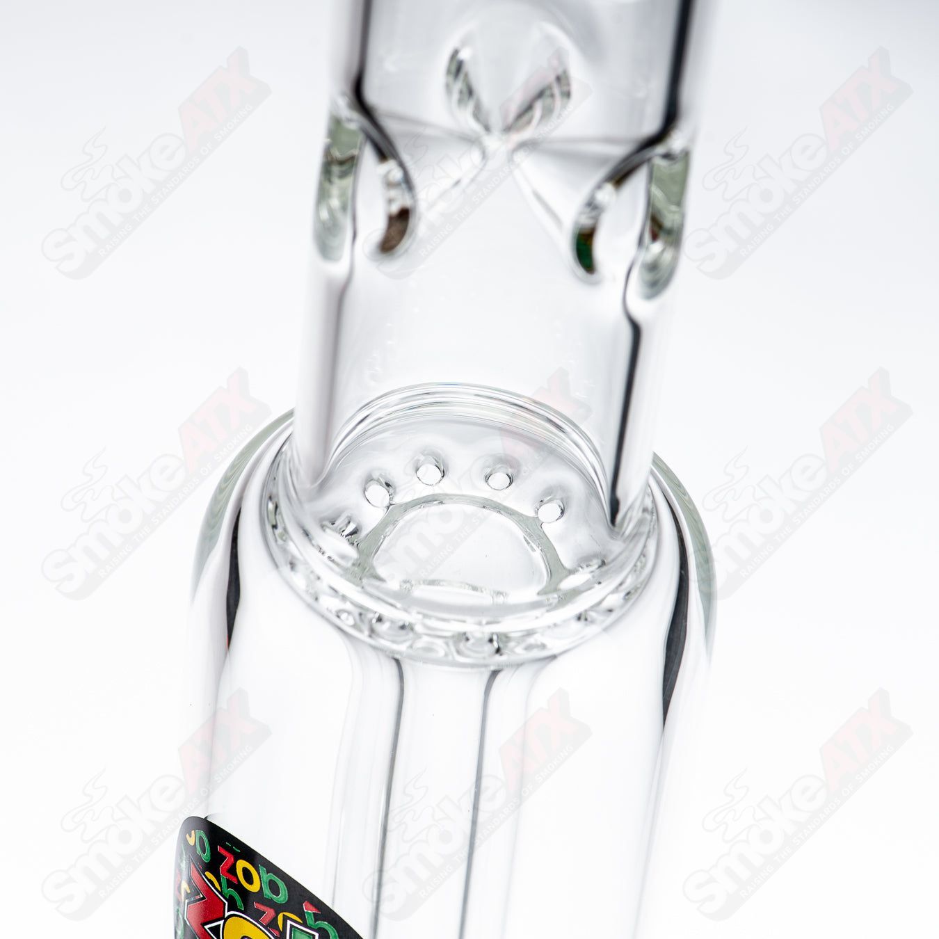 22-inch glass waterpipe beaker with single UFO design in Rasta colors by Zob, featuring vibrant glasswork and sturdy base.