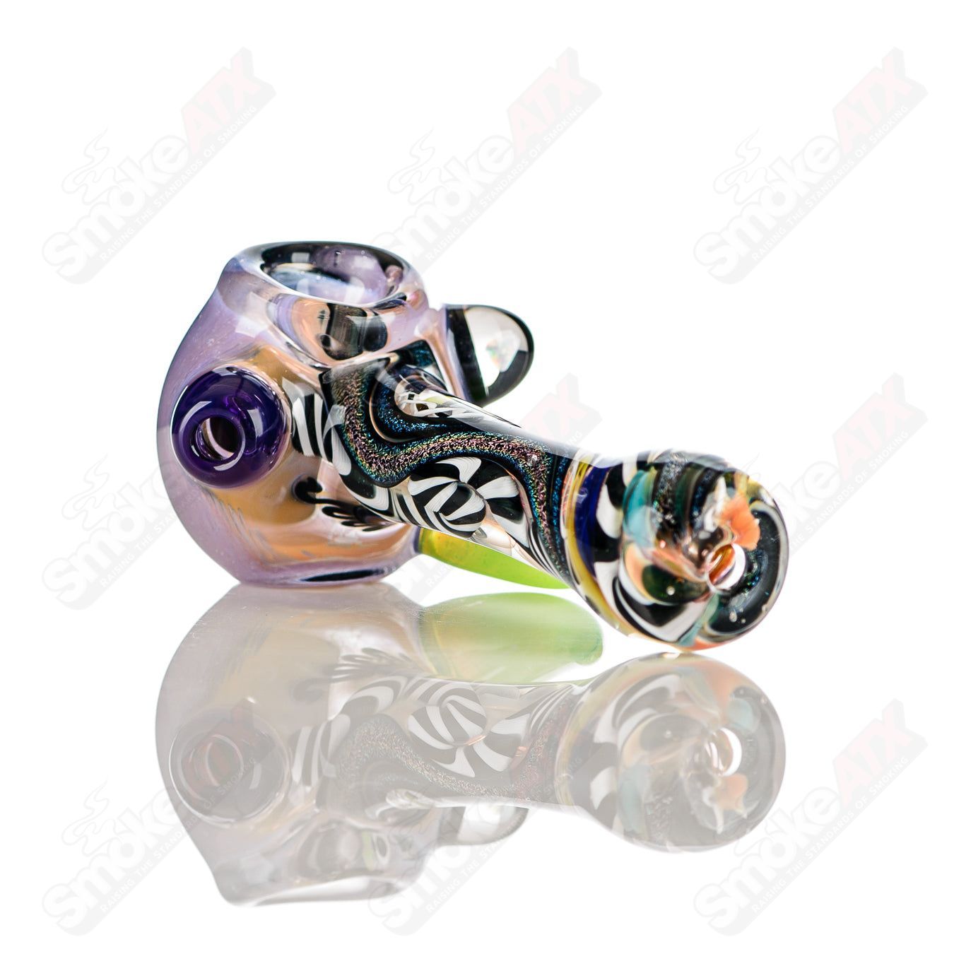 Color-worked IO spoon hand pipe by Jeremy from Oregon featuring vibrant 27-color design and intricate glass work.