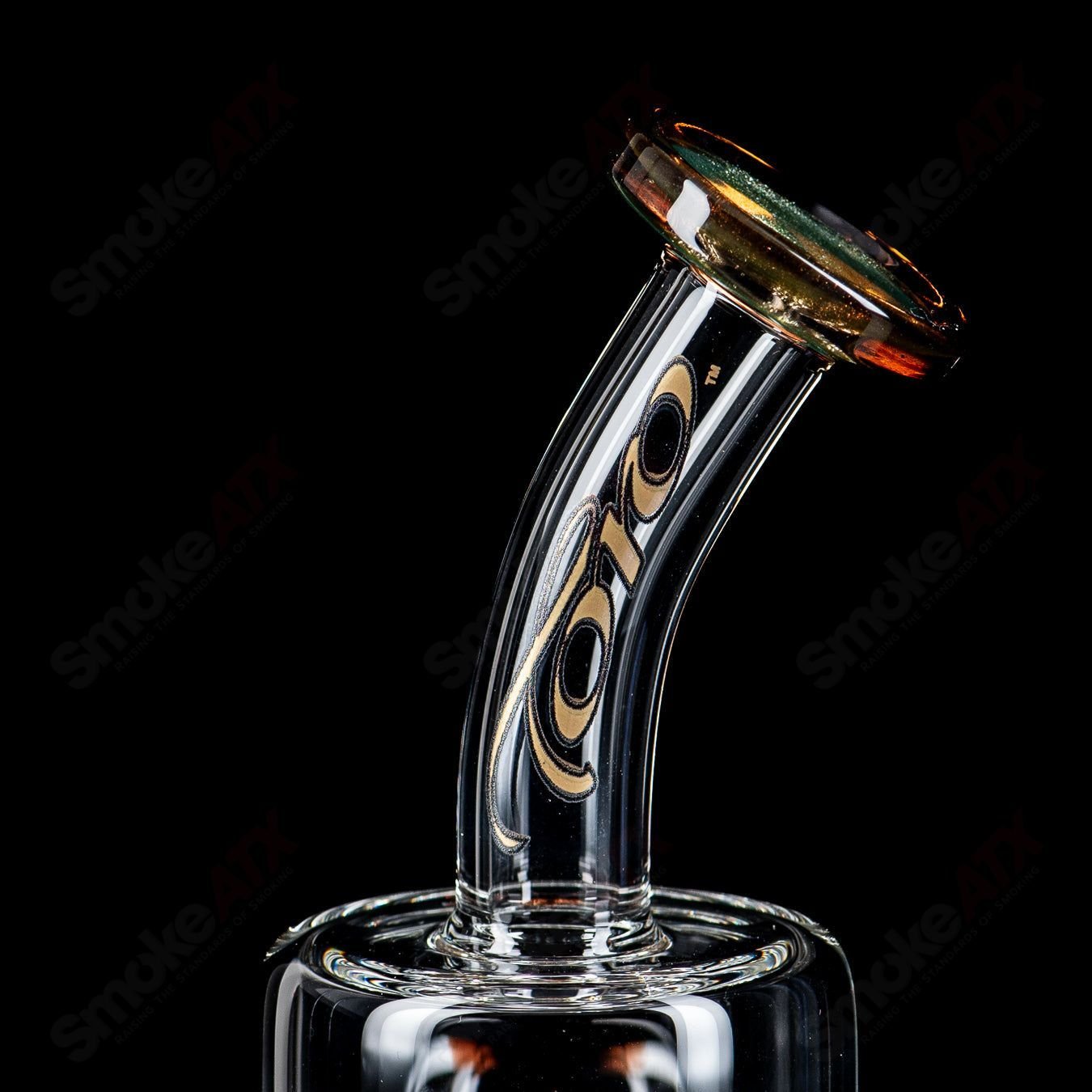Toro Glass 10mm double macro concentrate rig with colorful caps, clear glass design, and intricate details for dabbing.
