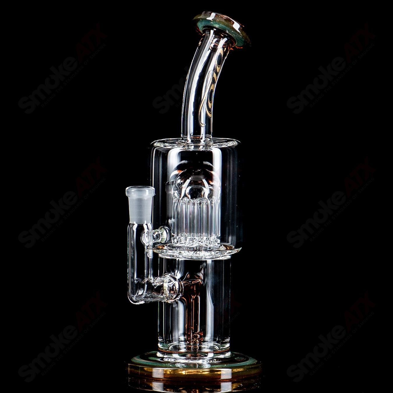 Toro Glass 10mm double macro concentrate rig with colorful caps, clear glass design and intricate details.