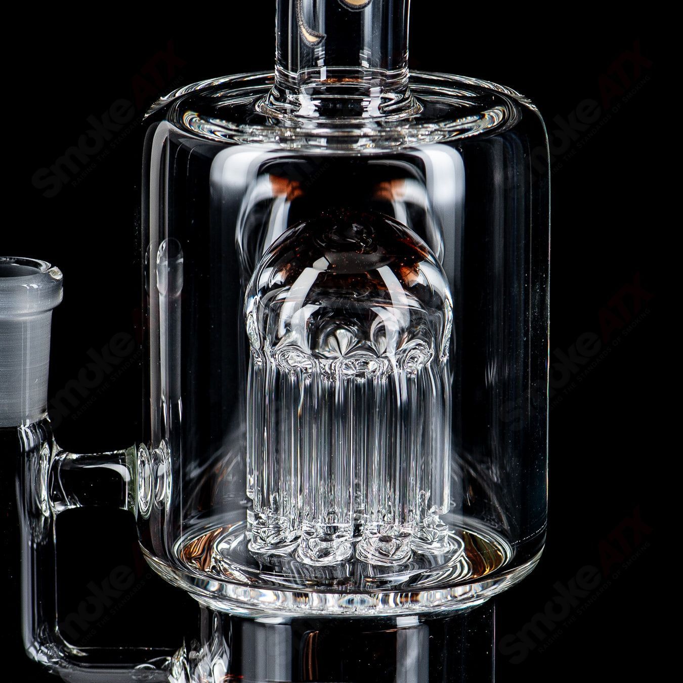 Toro Glass 10mm double macro concentrate rig with colorful caps, featuring detailed glasswork and sturdy construction.