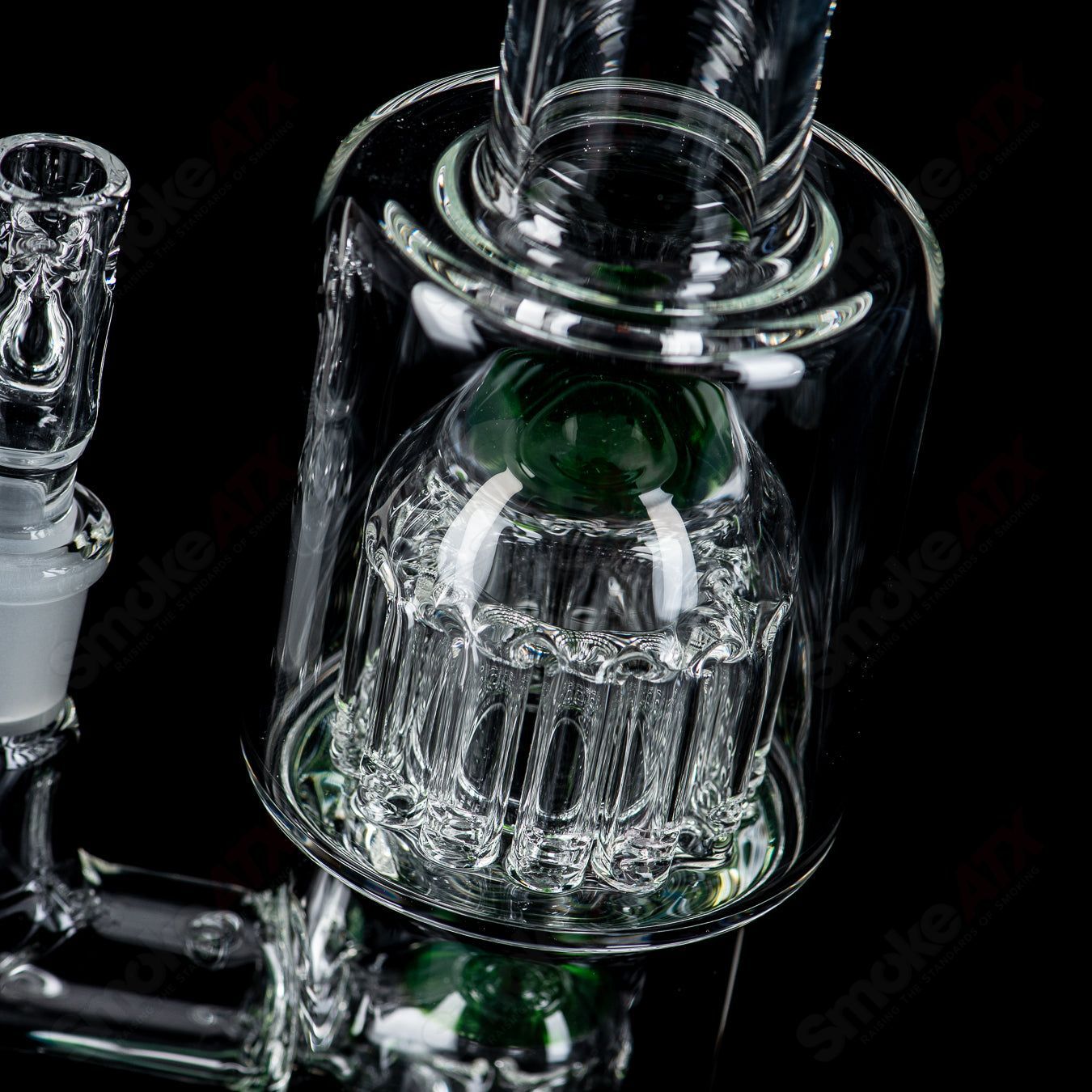 Toro 14mm straight glass bong with 7 to 13-arm perc and colorful cap, featuring clear glass construction for smooth hits.