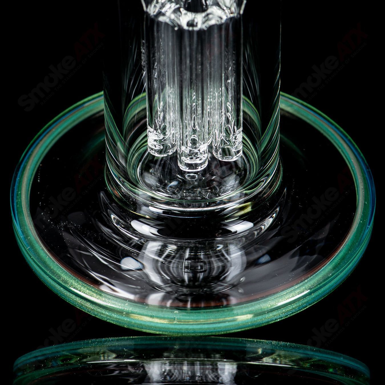 Toro 14mm straight glass bong with 7 to 13-arm perc and colorful cap, featuring clear Toro glass construction.