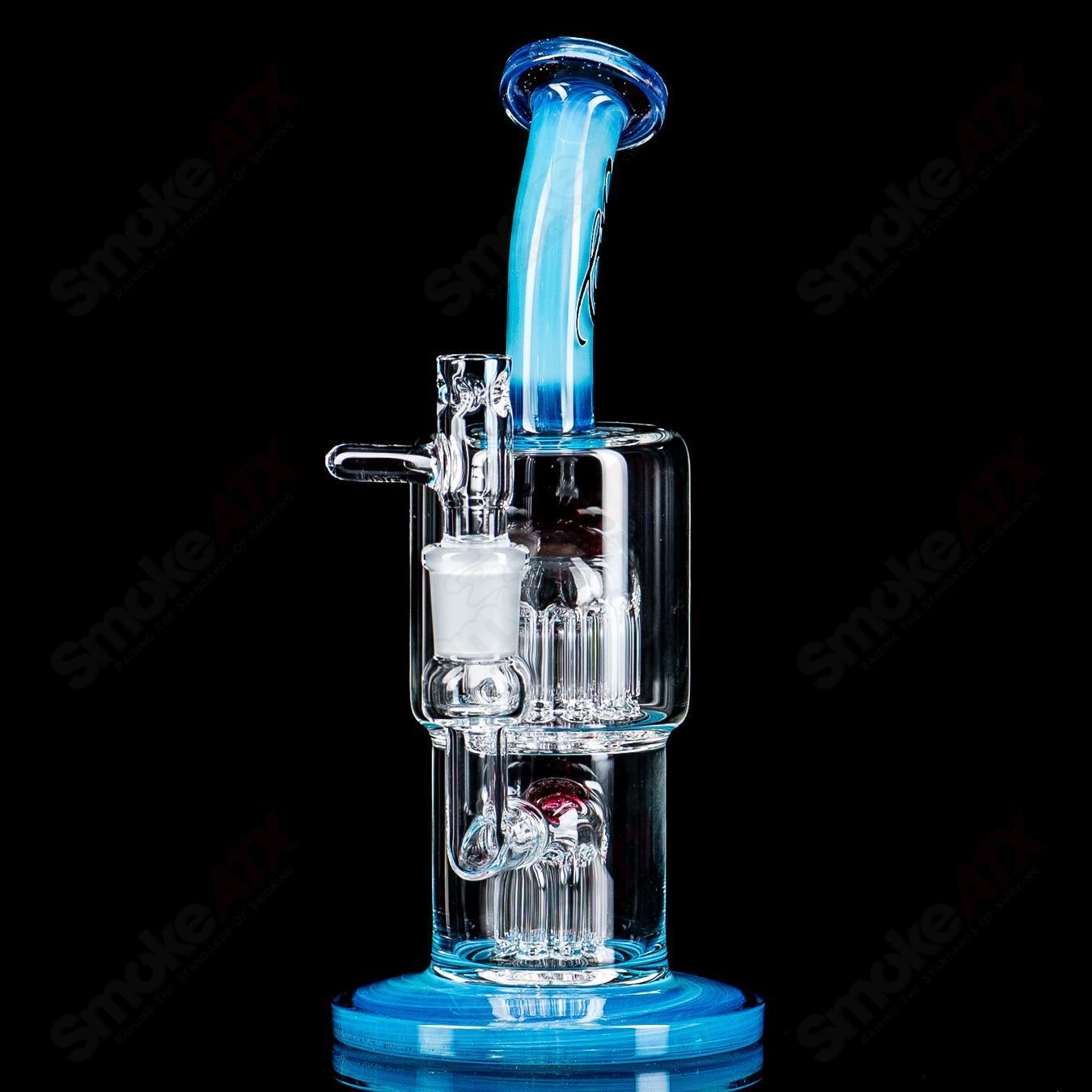 Toro Glass 14mm 8/13 Double Macro XL bubbler with full color accents, featuring intricate glass design and vibrant hues.