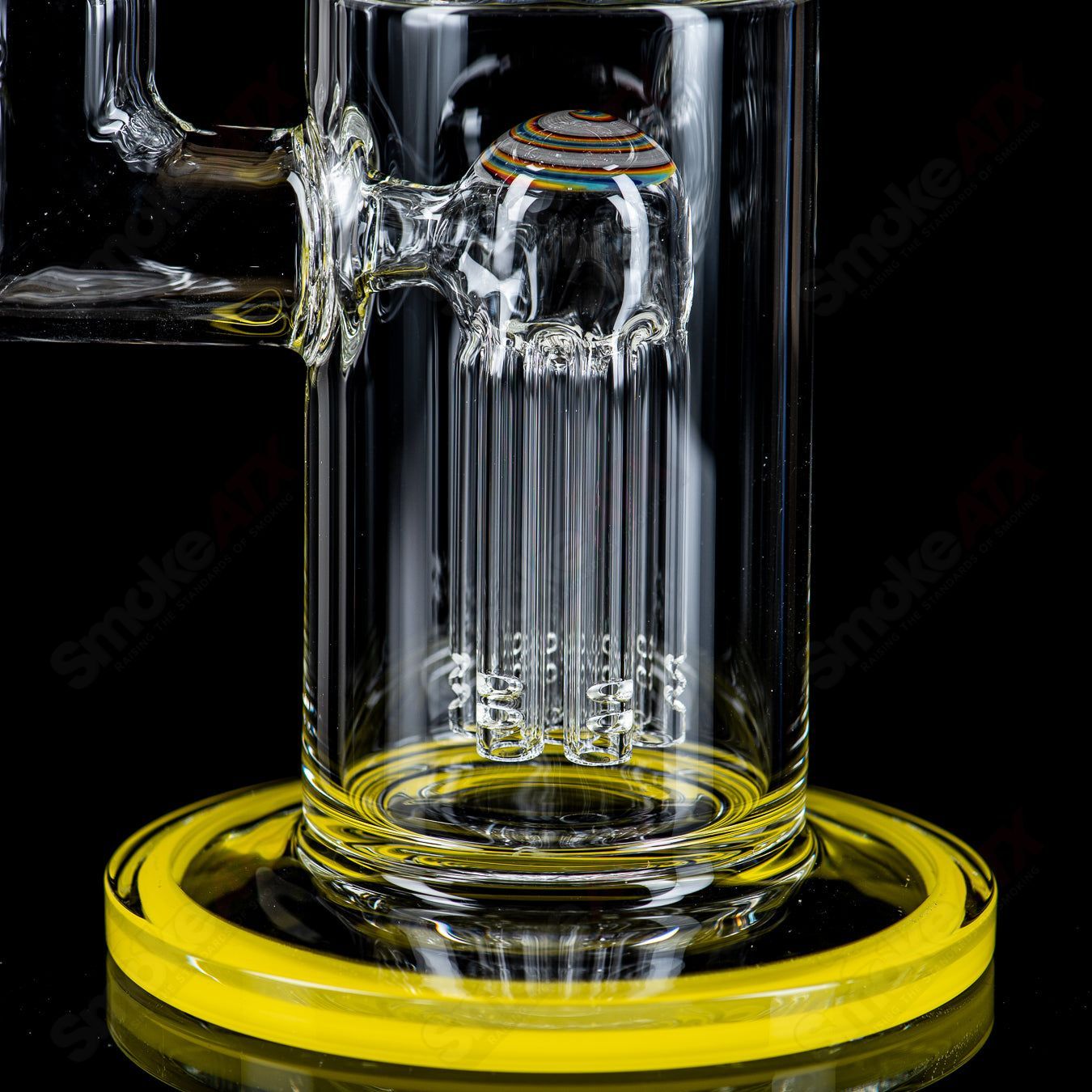 Toro 18mm 7/13 Arm Perc glass straight tube with reversal caps, featuring a sleek design and clear Toro glass construction.