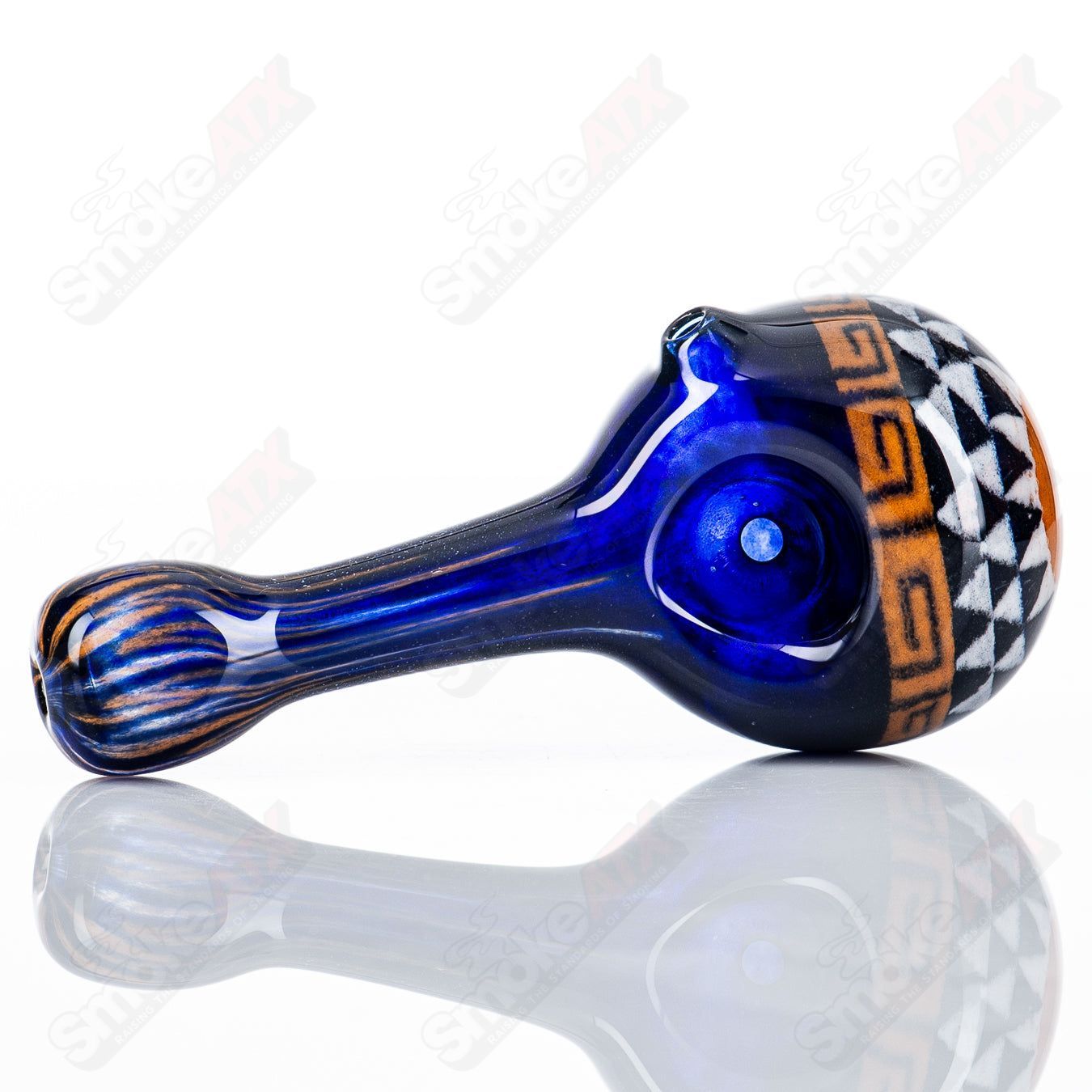 Glass pipe called #3 Classical Spoon in orange and blue by Steve Hoffman, featuring a sleek, colorful design.