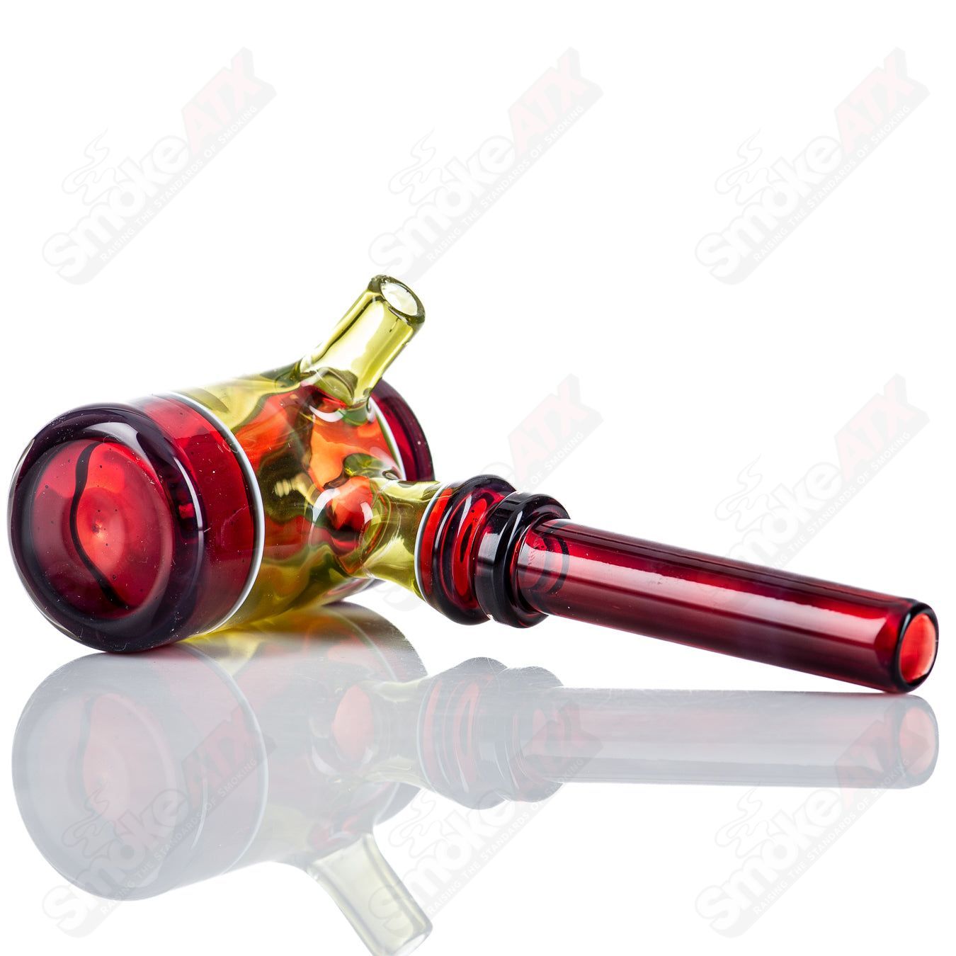 Colorful Kirkland Glassworks poker hand pipe with three vibrant colors and intricate glass details, designed for smoking enjoyment.