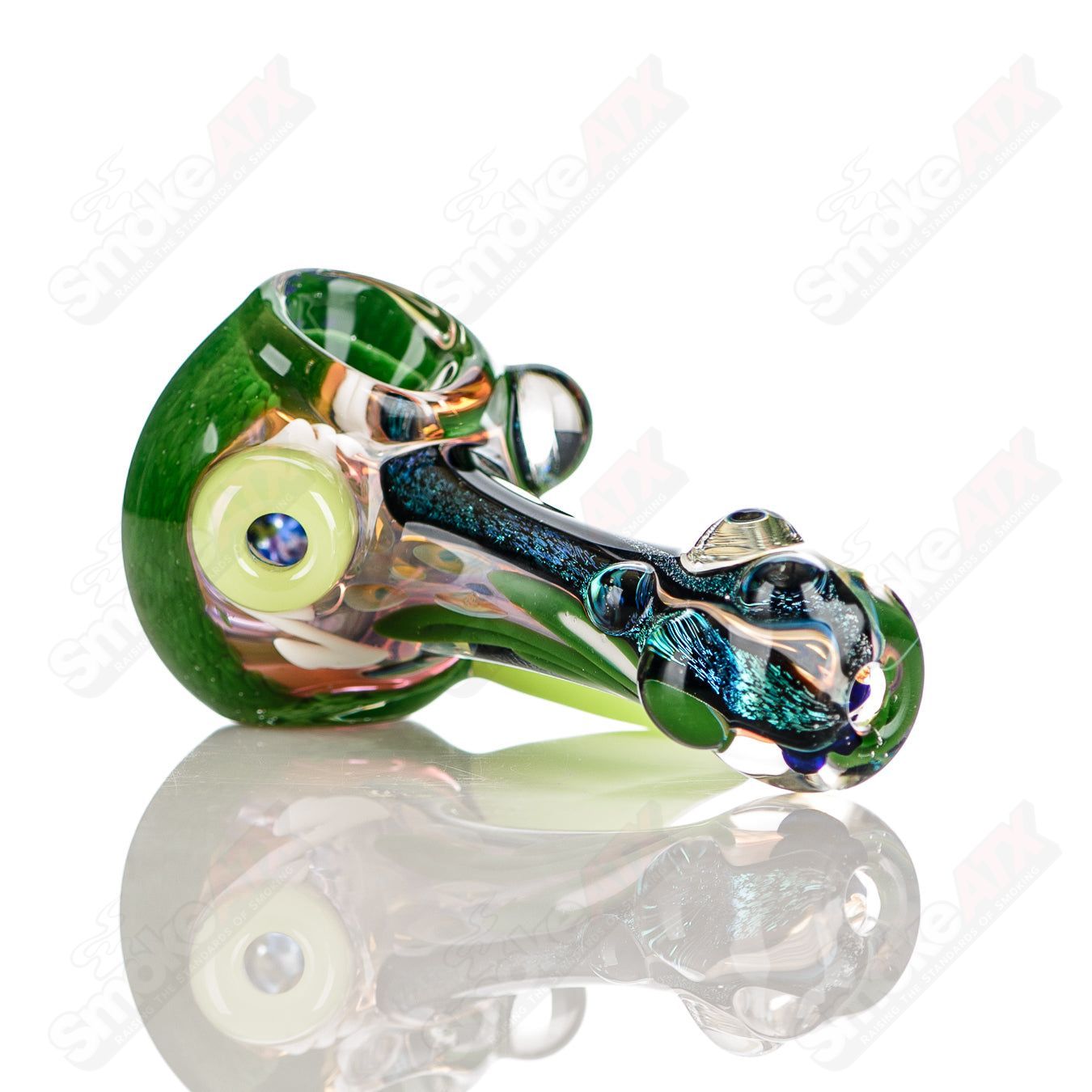 Jeremy from Oregon 3-color worked IO spoon hand pipe with colorful glass design and ergonomic shape.