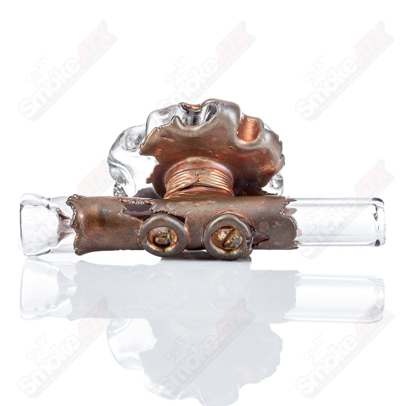 Glass electroformed gear chillum by Zack P x Snic, featuring intricate gear design and transparent glass construction.