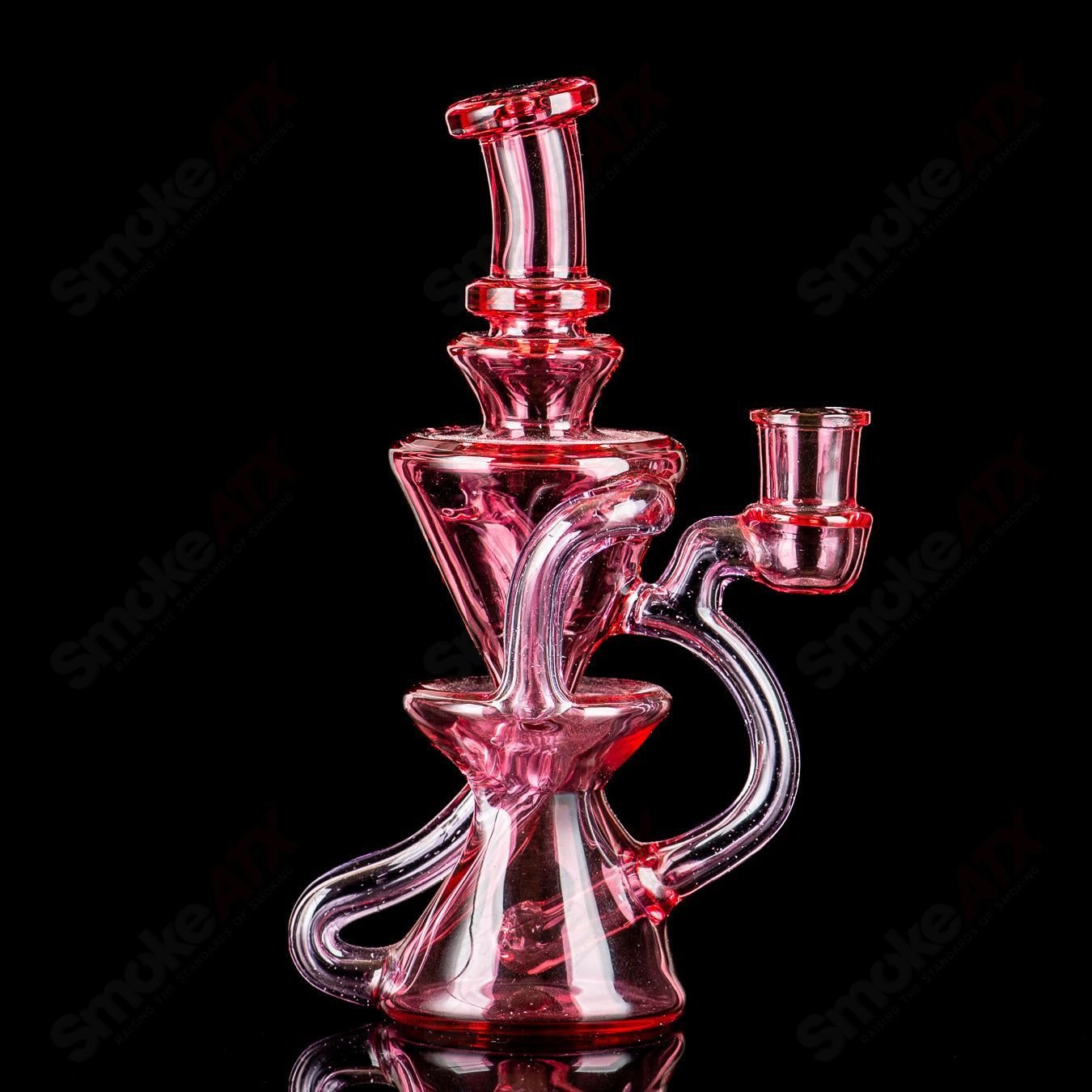 Mini recycler glass pipe by Captn Chronic featuring a heady design and vibrant colors, perfect for smooth, eco-friendly smoking sessions.