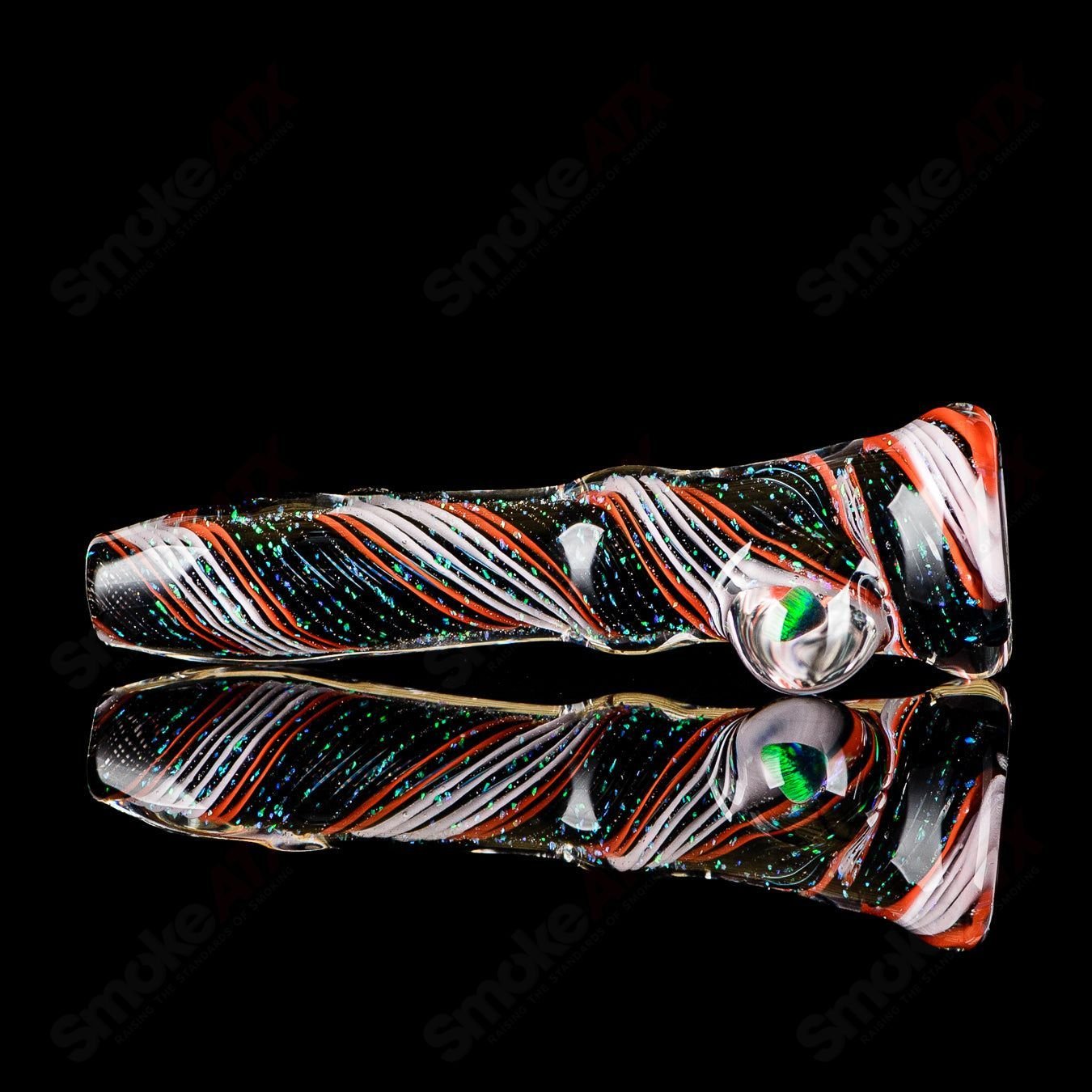 Glass Chillum by Rotational Science featuring a vibrant opal hitter with swirling colors and smooth finish.