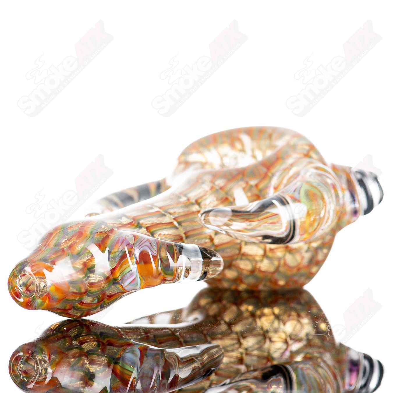JMK Glass Sceptre Steam Roller Spoon, clear glass hand pipe with intricate design, showcasing smooth curves and craftsmanship.
