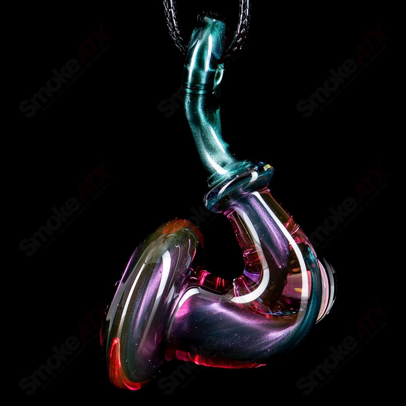 JMass Sherlock pendant with a heart-shaped opal, handcrafted glass jewelry featuring intricate details and vibrant colors.