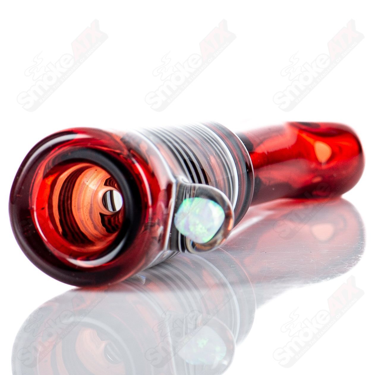 Kirkland Glassworks Wig Wag Chillim, a colorful heady glass chillum with intricate wig wag design, resting on a neutral surface.