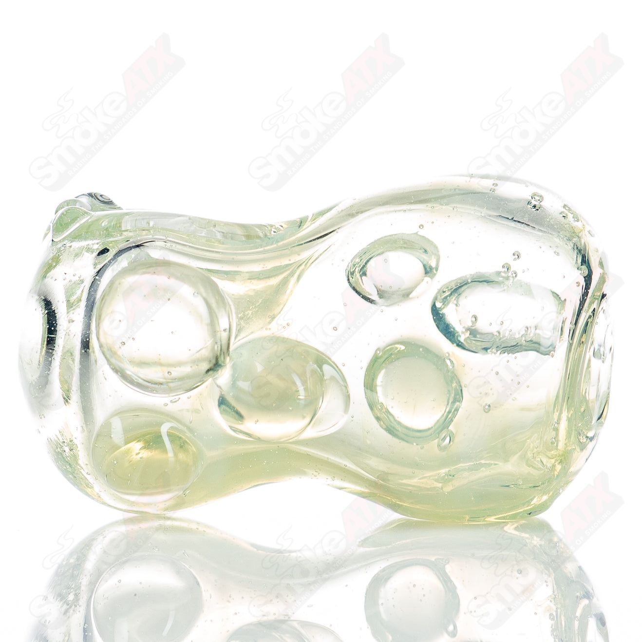 Glass pipe called the 31 Bean Spoon by Nobody, featuring a clear glass design with a rounded bowl and smooth mouthpiece.