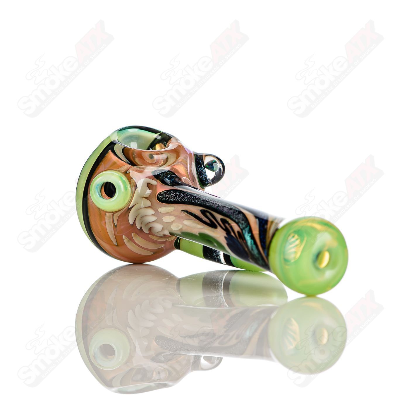 Color worked IO spoon hand pipe by Jeremy from Oregon with vibrant 34-color design and intricate glass craftsmanship.