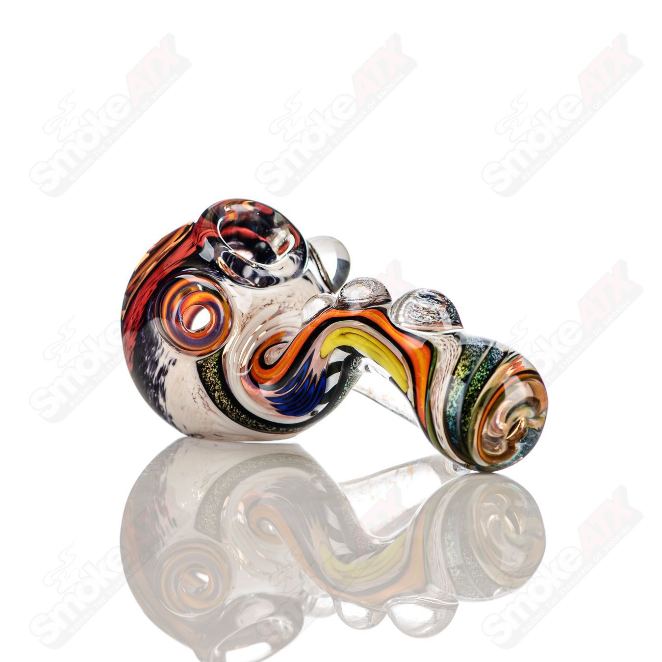 Colorfully worked IO Sherlock hand pipe by Jeremy from Oregon, featuring vibrant 36-color design and intricate glass details.