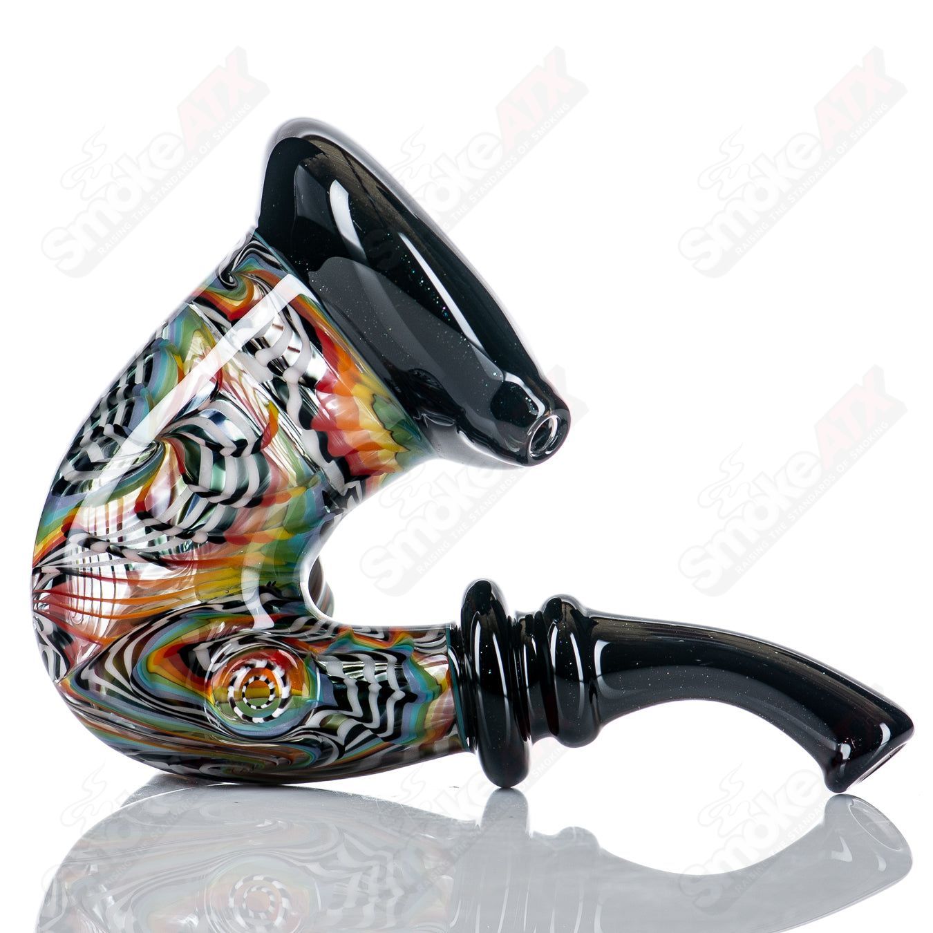 JMass Sherlocks heady glass pipe with 3D Fire & Ice Reversal design by Shawna Benson, featuring vibrant red, blue, and clear glass details.