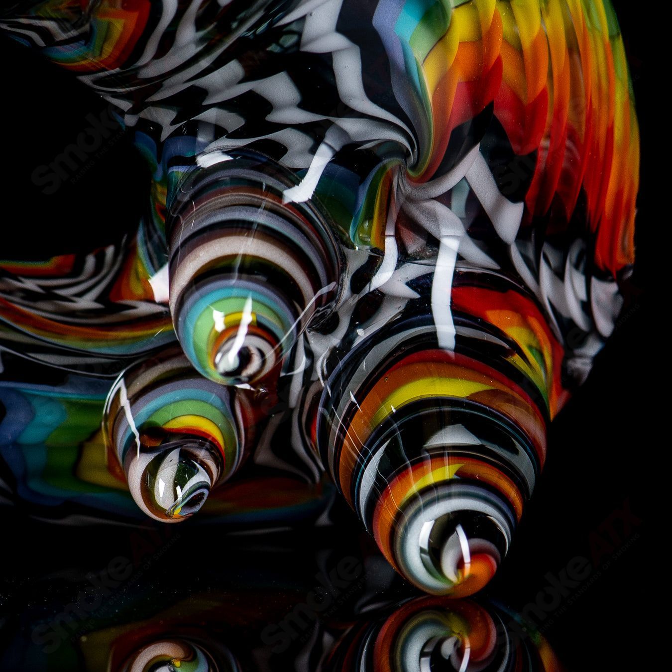 JMass Sherlocks heady glass pipe featuring fiery and icy 3D fire and ice reversal artwork by Shawna Benson.