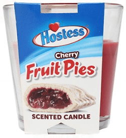 3oz Licensed Snacks Scented Candles featuring colorful packaging and themed designs, ideal for creating a cozy aroma.