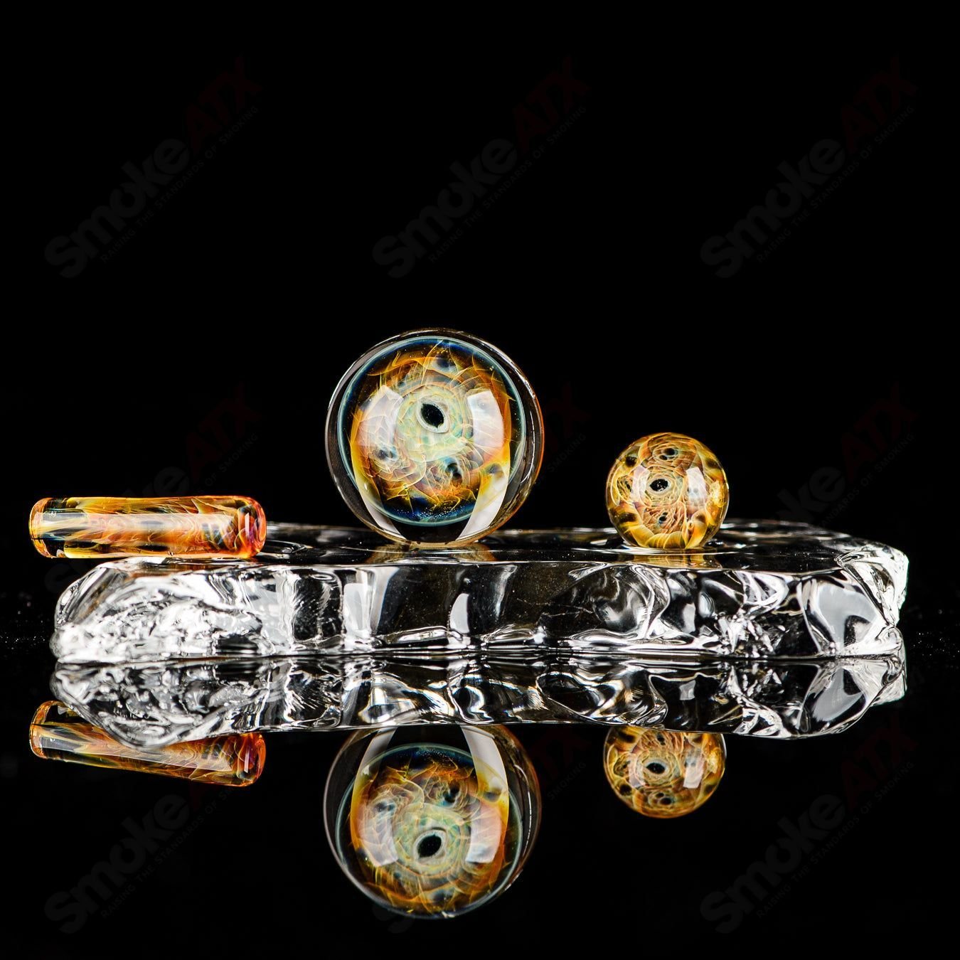 Three-piece UV eye cluster Milli slurper set by Indo Glass, featuring colorful glass accessories for smoking or dabbing.