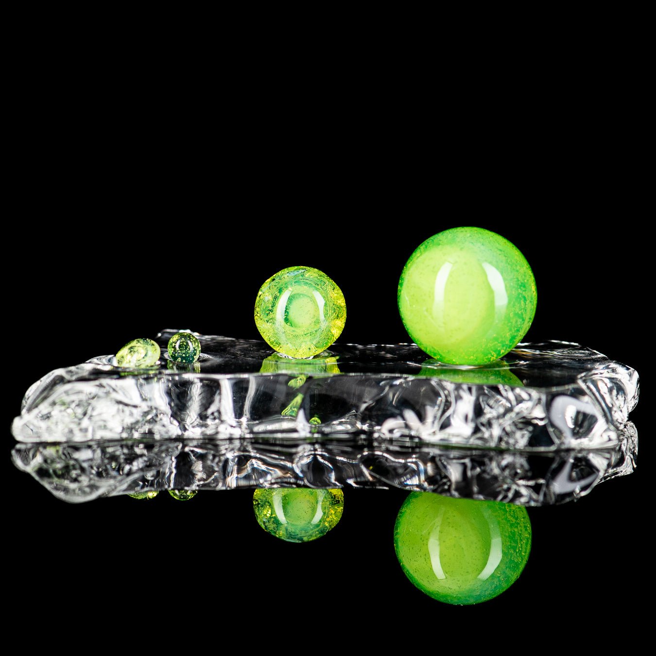 Three-piece UV mushroom terp slurper set by Ganja Grimmlin Glass, featuring colorful glass tools for concentrates.