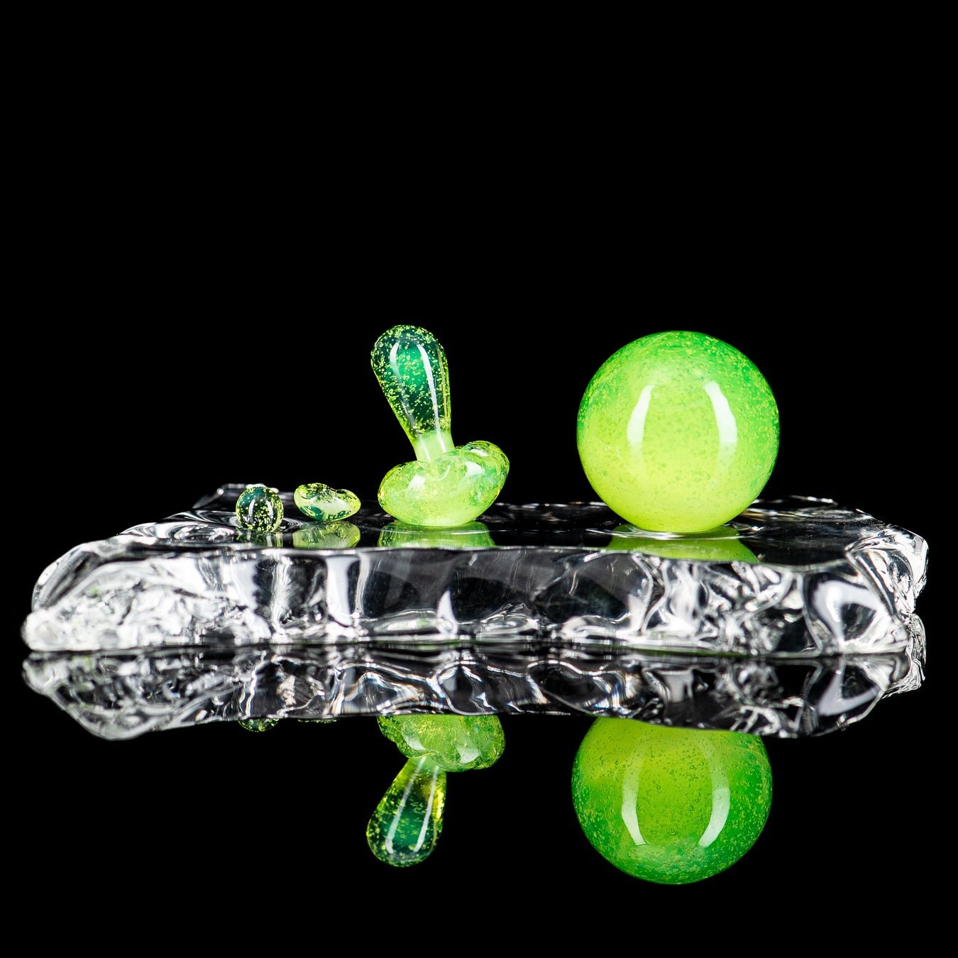 Three-piece UV mushroom terp slurper set by Ganja Grimmlin Glass, featuring colorful glass tools for concentrates.