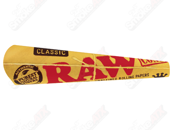 Three RAW king size classic cones for rolling, made from natural unbleached paper, ideal for cannabis or herb use.