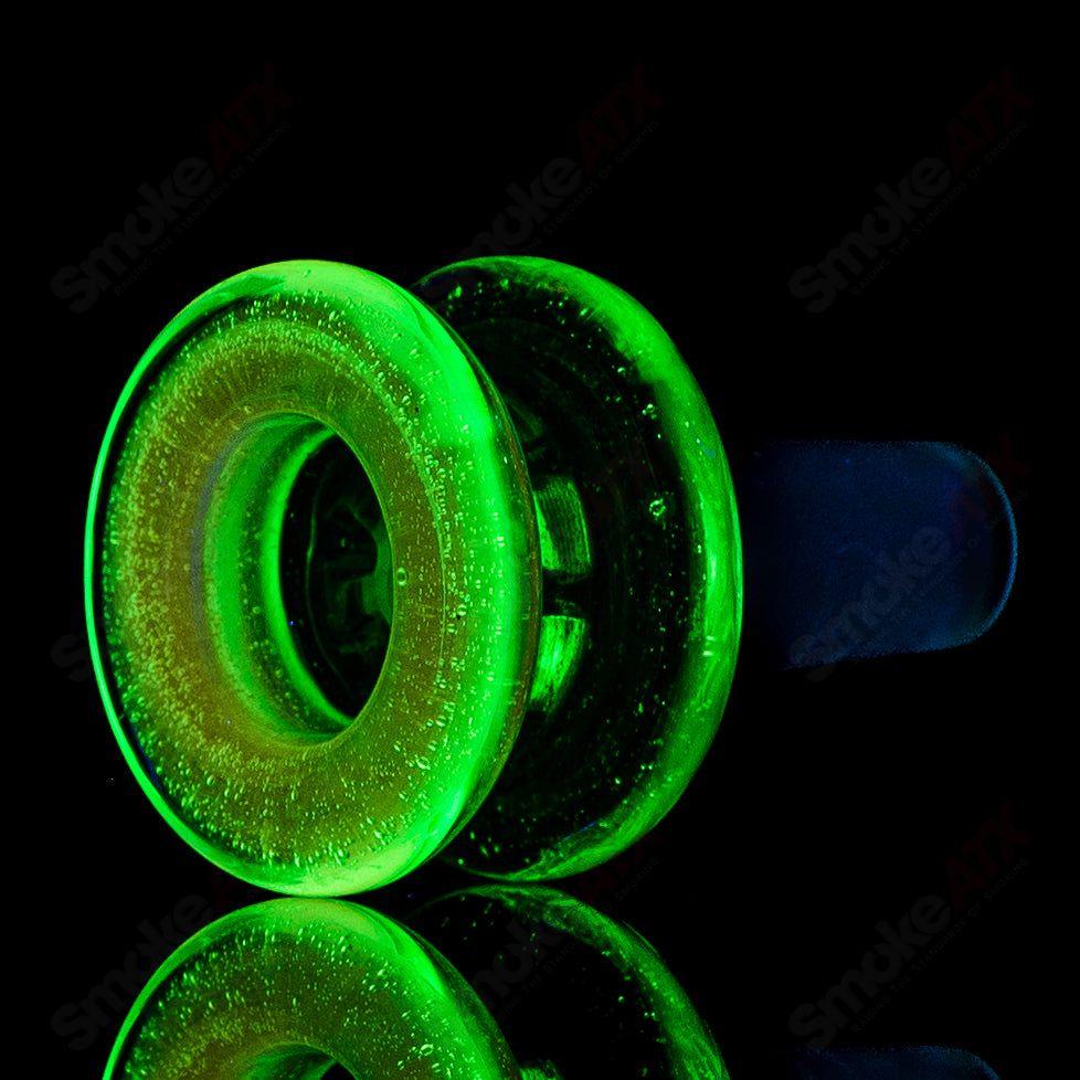 Mobius 14mm UV color elements multi-hole bowl made of heady glass with vibrant UV-reactive design and multiple holes for airflow.