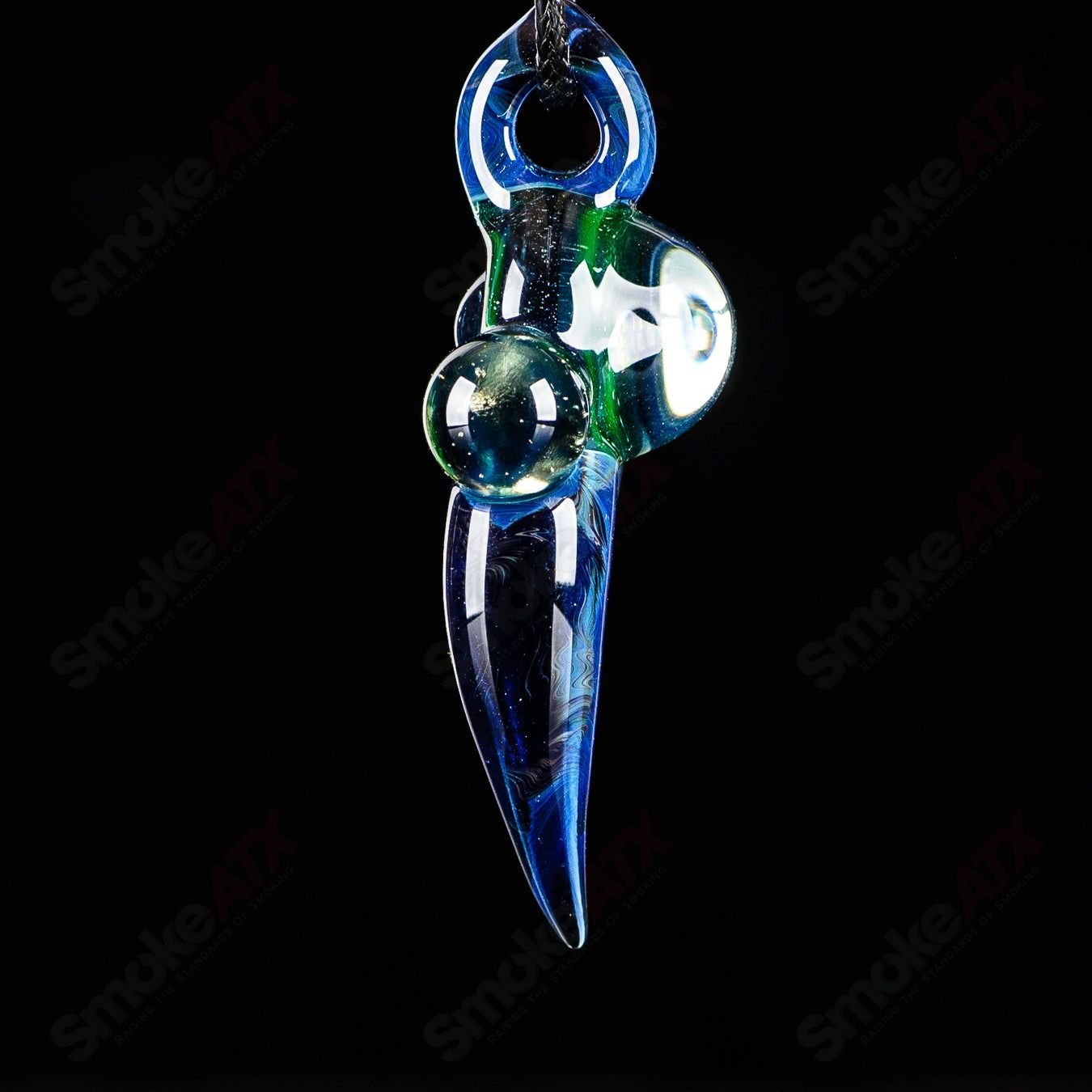 Dosh Glass #4 Amulet Pendant featuring colorful glass artwork, hanging as a decorative heady glass pendant.