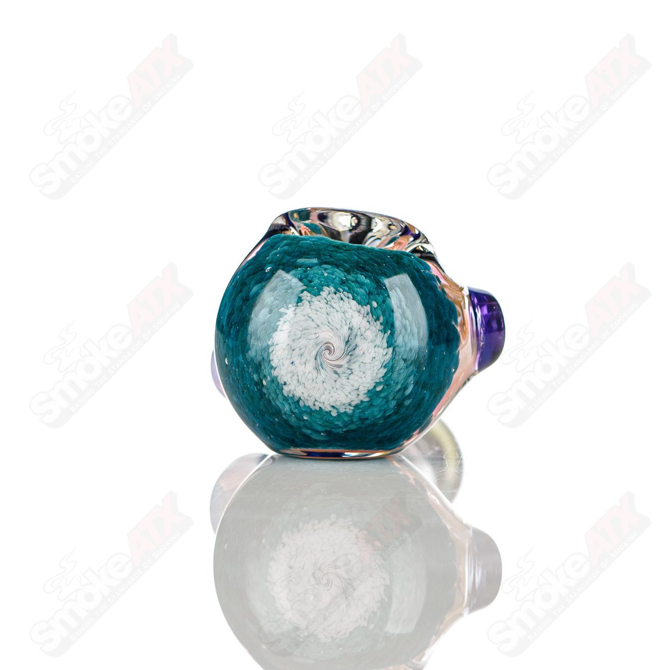 Colorfully worked IO spoon hand pipe by Jeremy from Oregon with vibrant four-color design and smooth glass finish.