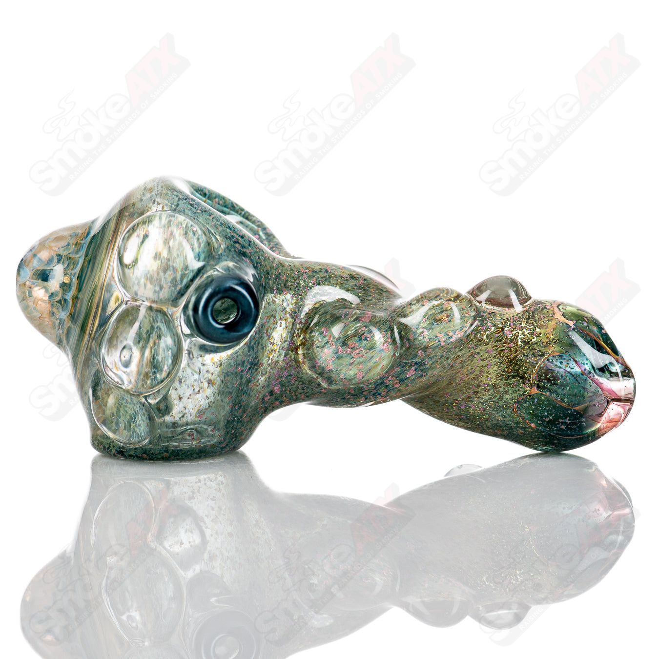 Molten Imagination Dragon Skin hand pipe with honeycomb design, made of glass, showcasing intricate dragon scale details.