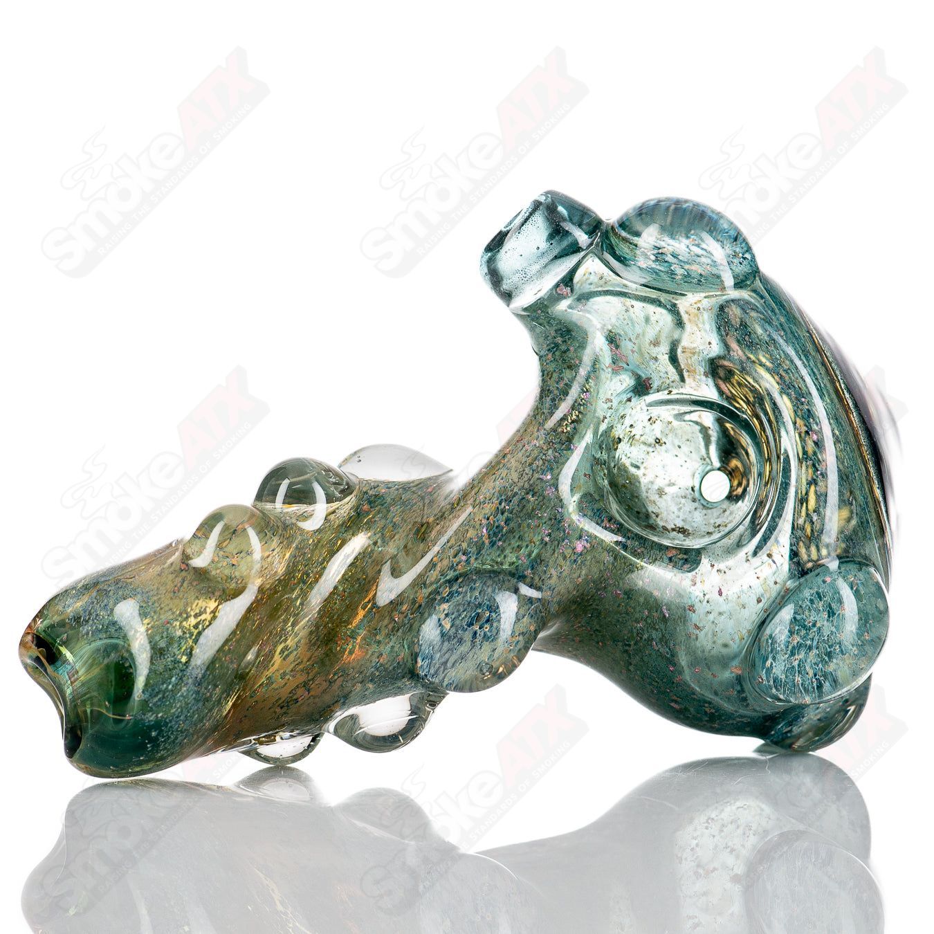 Molten Imagination Dragon Skin glass hand pipe with honeycomb design, featuring a detailed dragon scale pattern and vibrant colors.