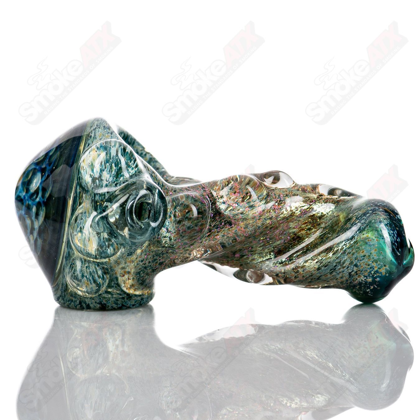 Molten Imagination Dragon Skin hand pipe with honeycomb glass design, featuring intricate dragon scale patterns in vibrant colors.