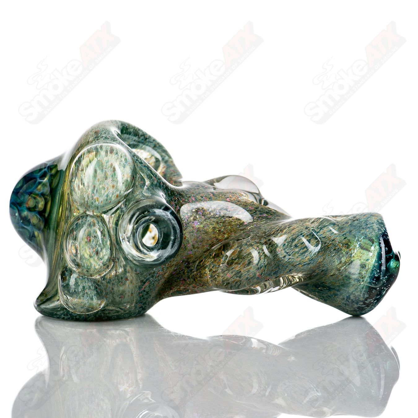Molten Imagination Dragon Skin glass hand pipe with honeycomb pattern, featuring intricate dragon scale design.