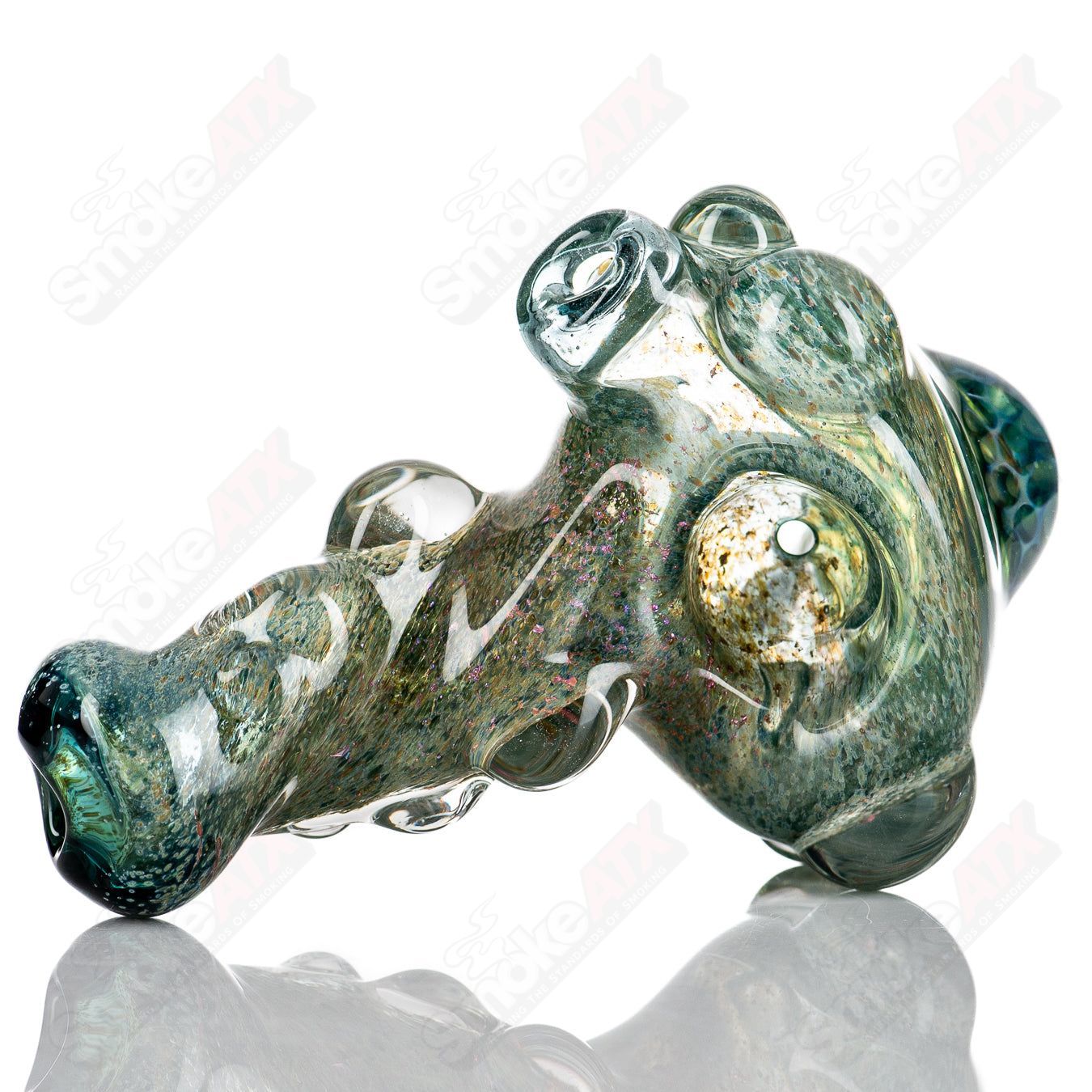 Molten Imagination Dragon Skin glass hand pipe with honeycomb design, featuring intricate dragon scale pattern and vibrant colors.