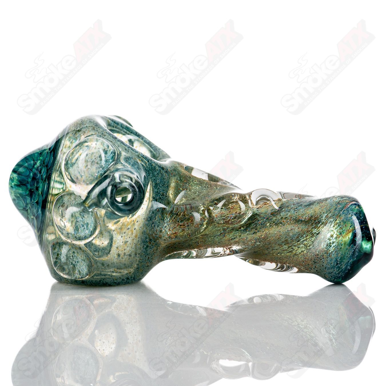 Molten Imagination Dragon Skin hand pipe with honeycomb glass design, featuring intricate dragon scale patterns.