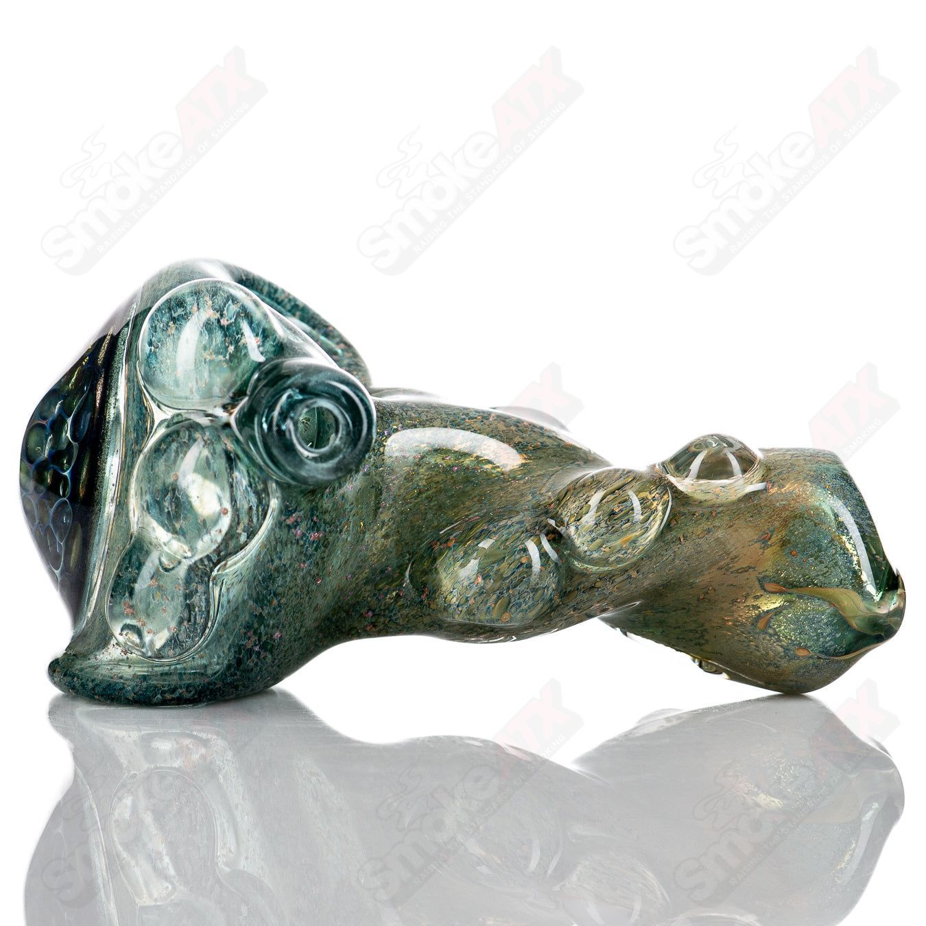 Glass hand pipe featuring Molten Imagination's Dragon Skin design with honeycomb pattern, showcasing intricate glass artistry.