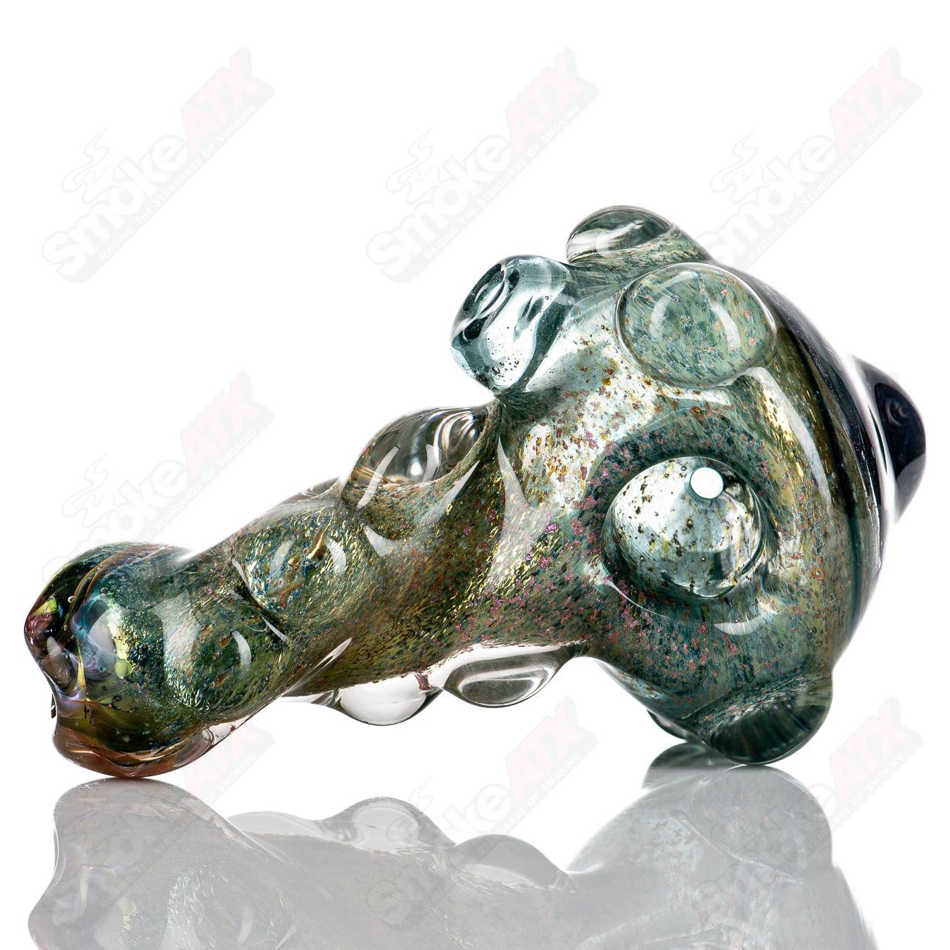 Molten Imagination Dragon Skin glass hand pipe with honeycomb design, featuring detailed dragon scale pattern and clear glass accents.